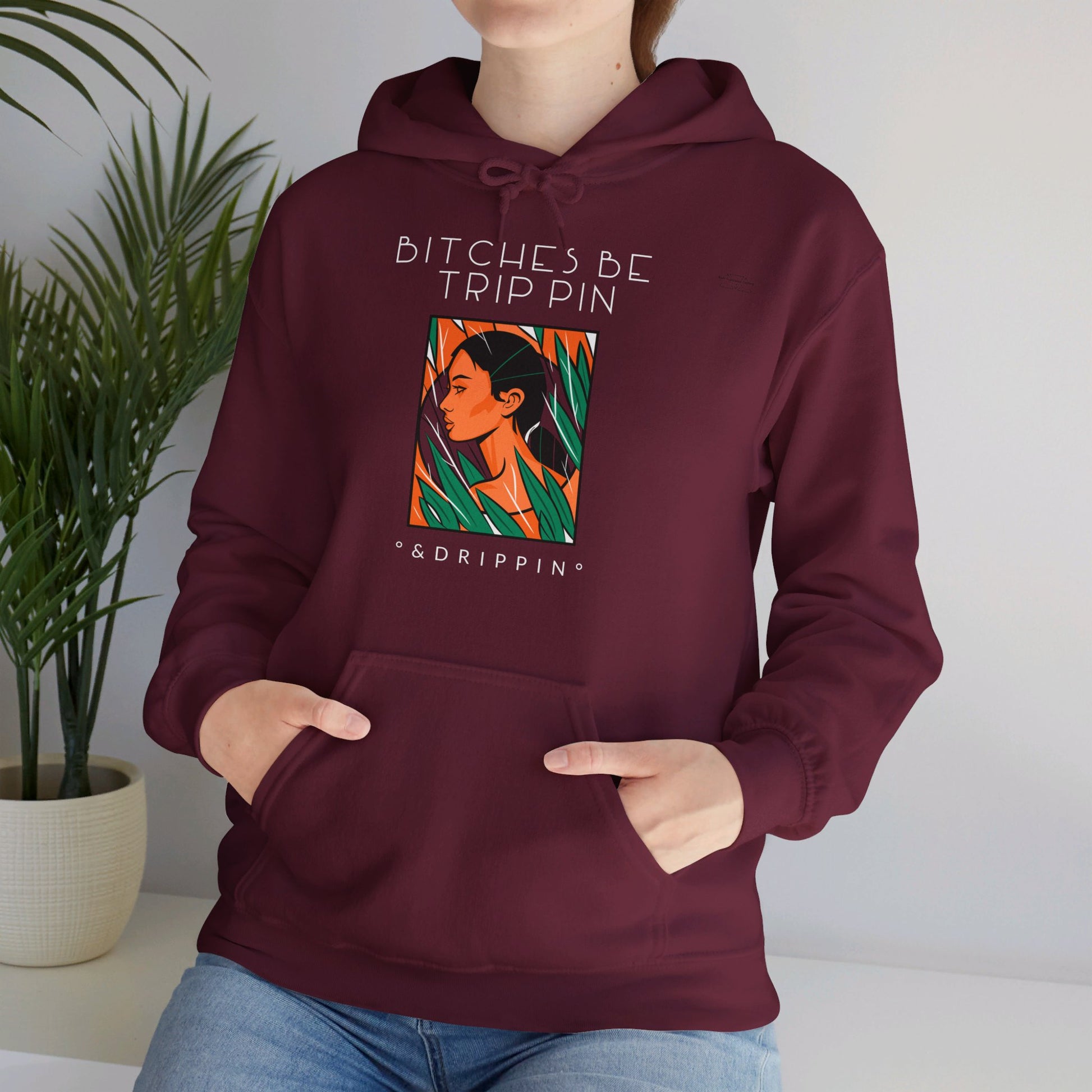 English 'Bitches be trippin & drippin', Native Woman Green Leaves - Unisex Heavy Blend Hoodie - Rude Translation Clothing